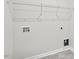 Utility room features hookups for the washer and dryer, and shelving above at 1304 Jasmine View Way, Knightdale, NC 27545