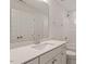 Modern bathroom featuring white cabinets, quartz countertop, and chrome finishes at 80 Bold Dr, Youngsville, NC 27596