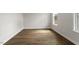 Bedroom with wood-look flooring and two windows providing lots of natural light at 80 Bold Dr, Youngsville, NC 27596