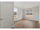 Bedroom features hard surface floors and two windows providing lots of natural light at 80 Bold Dr, Youngsville, NC 27596