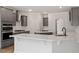 Spacious kitchen with an island, gray cabinets, white countertops, and stainless appliances at 80 Bold Dr, Youngsville, NC 27596