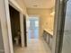 Bathroom featuring a dual entry, white cabinets, and a water closet at 1056 Fairhaven Dr # 97, Mebane, NC 27302