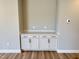 Cozy living room features custom built in cabinets and countertop at 1056 Fairhaven Dr # 97, Mebane, NC 27302