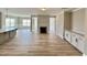 Spacious living room offers lots of natural light, fireplace, flows into kitchen and dining areas at 1056 Fairhaven Dr # 97, Mebane, NC 27302