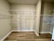 Spacious walk-in closet with wire shelving for optimal organization and storage at 1056 Fairhaven Dr # 97, Mebane, NC 27302