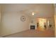Bright living room featuring a fireplace, vaulted ceiling and ceiling fan at 11370 Clubhaven Pl # 103, Raleigh, NC 27617