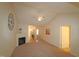 Spacious living room with vaulted ceiling, fireplace and neutral decor at 11370 Clubhaven Pl # 103, Raleigh, NC 27617