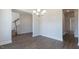 Bright living room with a staircase and hardwood flooring at 1237 Jasmine View Way, Knightdale, NC 27545