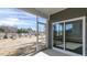 View from the screened porch, overlooking the green backyard and charming neighborhood at 1237 Jasmine View Way, Knightdale, NC 27545