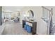 Inviting foyer with staircase, console table with decor, and an open view to the living room at 512 Lemon Daisy Ln, Knightdale, NC 27545