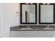 Bathroom vanity featuring double sinks, sleek countertops, and modern mirrors, adding elegance and functionality at 524 Lemon Daisy Ln, Knightdale, NC 27545