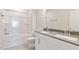 Bathroom featuring a tub, shower, double vanity, and ample counter space, providing a practical and stylish design at 524 Lemon Daisy Ln, Knightdale, NC 27545