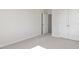 Clean bedroom with neutral carpet, white walls and closet with double doors at 524 Lemon Daisy Ln, Knightdale, NC 27545