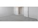 Empty bedroom with light carpet and open doors at 524 Lemon Daisy Ln, Knightdale, NC 27545