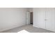 Empty bedroom with a closet and light carpet at 524 Lemon Daisy Ln, Knightdale, NC 27545