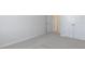 Cozy bedroom featuring carpet flooring, a closet, and a hallway entrance, providing practical and private space at 524 Lemon Daisy Ln, Knightdale, NC 27545
