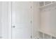 Mudroom with built in storage bench and storage shelves at 524 Lemon Daisy Ln, Knightdale, NC 27545