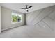 Bright bedroom with modern accent wall, neutral carpet, and lots of natural light at 205 Red Cardinal Ct, Youngsville, NC 27596