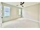 Bright bedroom with carpet, natural light and charming paneled accent wall at 205 Red Cardinal Ct, Youngsville, NC 27596