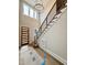 Entryway featuring a wood front door, high ceilings, modern light fixture, and stairway at 205 Red Cardinal Ct, Youngsville, NC 27596