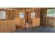 Interior of a barn structure with stalls at 7610 Buckhorn Rd, Hillsborough, NC 27278