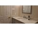 Bathroom featuring a modern vanity, marble countertop, and fixtures with a framed mirror at 7610 Buckhorn Rd, Hillsborough, NC 27278