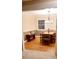 Bright dining room with hardwood floors and a traditional chandelier at 7610 Buckhorn Rd, Hillsborough, NC 27278