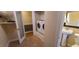 Functional laundry room with a washing machine, dryer, and pedestal sink at 7610 Buckhorn Rd, Hillsborough, NC 27278