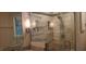 Modern shower with decorative tiles and glass doors, showcasing an updated bathroom design at 7610 Buckhorn Rd, Hillsborough, NC 27278