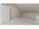 Small bedroom with carpet and an access door at 6720 Fawn Hoof Trl, Holly Springs, NC 27540