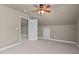 Bedroom with carpeted floor and ceiling fan at 6720 Fawn Hoof Trl, Holly Springs, NC 27540