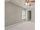 Bright bedroom with window and ceiling fan at 6720 Fawn Hoof Trl, Holly Springs, NC 27540