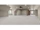Large bonus room with carpeted floor and multiple windows at 6720 Fawn Hoof Trl, Holly Springs, NC 27540