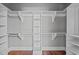 Large walk-in closet with ample shelving and hanging space at 6720 Fawn Hoof Trl, Holly Springs, NC 27540