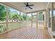 Relaxing screened porch overlooking backyard at 6720 Fawn Hoof Trl, Holly Springs, NC 27540