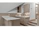 Wet bar with granite countertop and tile backsplash at 6720 Fawn Hoof Trl, Holly Springs, NC 27540