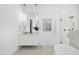 Spacious bathroom with a vanity, walk-in shower, and modern fixtures at 712 Daniels St, Raleigh, NC 27605