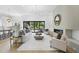 Open concept living room with fireplace and sliding glass doors leading to outdoor living area at 712 Daniels St, Raleigh, NC 27605