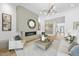 Open concept living room with fireplace and sliding glass doors leading to outdoor living area at 712 Daniels St, Raleigh, NC 27605
