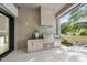 This outdoor kitchen features stainless steel appliances and ample counter space for entertaining guests at 712 Daniels St, Raleigh, NC 27605