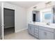 Bathroom features a double sink vanity, and walk-in closet access at 525 Glenkirk Pl, Garner, NC 27529