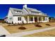Beautifully constructed clubhouse in the Annandale community features a covered entrance at 525 Glenkirk Pl, Garner, NC 27529