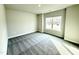 Bedroom with neutral carpet and a large window allowing lots of natural light at 55 Capeside Ct, Lillington, NC 27546