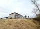 View of the back of the home and the surrounding lot at 31 Capeside Ct, Lillington, NC 27546