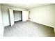 Bedroom with closet and doorways. Clean carpet at 31 Capeside Ct, Lillington, NC 27546