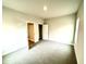 Spacious carpeted bedroom with ample natural light at 31 Capeside Ct, Lillington, NC 27546