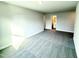 Bedroom with natural light and carpet with view to bathroom at 31 Capeside Ct, Lillington, NC 27546