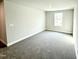 Bedroom with natural light and carpet. Clean interior at 31 Capeside Ct, Lillington, NC 27546