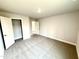 A spacious bedroom with carpet and an open closet, providing ample storage at 31 Capeside Ct, Lillington, NC 27546