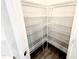 Spacious walk-in pantry with wire shelving for organized food storage at 31 Capeside Ct, Lillington, NC 27546
